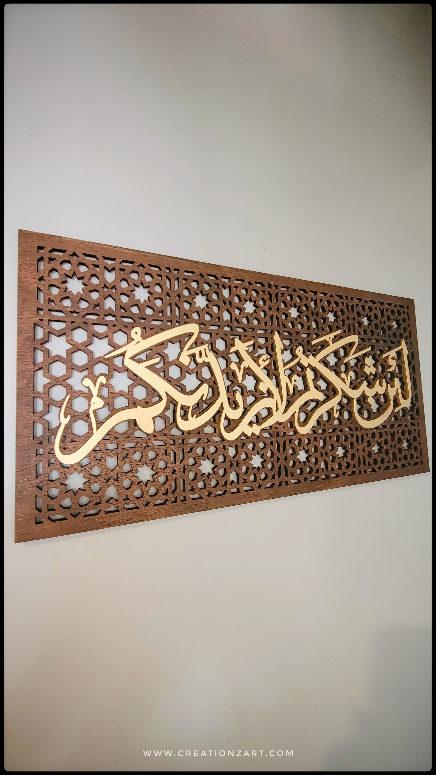 Lain Shakartum art work with Moroccan pattern background